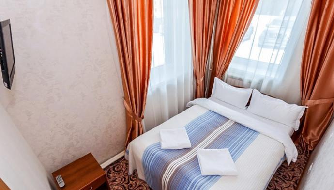 Спальня в 2 местном, 2 комнатном, Стандарте Улучшенный № 101 гостиницы Grunhof. Шерегеш